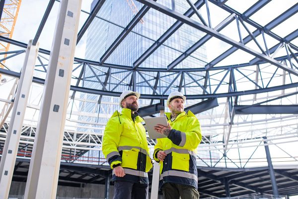 men-engineers-standing-outdoors-on-construction-si-small.jpg